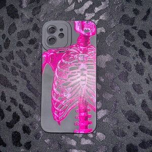 I am selling HOT PINK IPHONE 12 SKULL PHONE CASE.